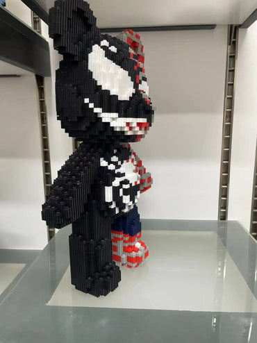 Building block bear sculpture Black-white-red brick toy Modular interlocking brick design Dynamic brick-built animal figure Artistic LEGO-inspired collectible Precision-engineered building blocks Modern minimalist block art STEM-focused creative toy