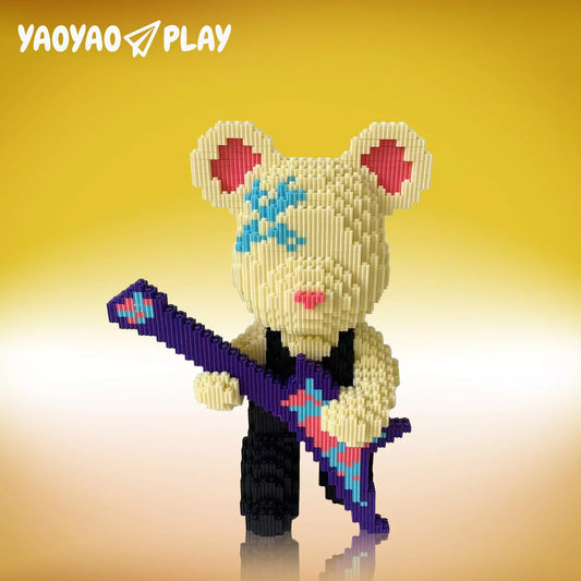A yellow ​​Brick Bear toy​​ with pink ears, blue face accents, and purple guitar, posed against a luminous yellow gradient.